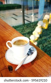 a cup of coffee on table