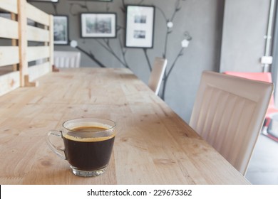 Cup Of Coffee On Table In Cafe