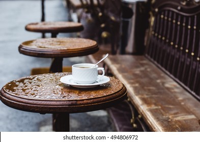 Cup Of Coffee On A Table, A Cafe On The Street, Rain