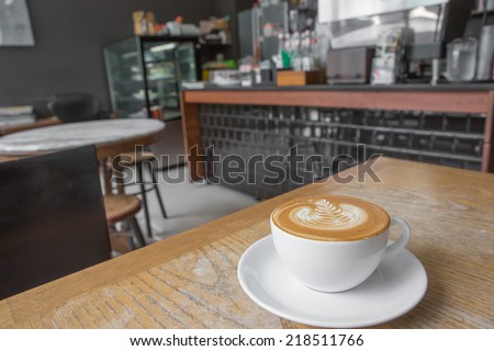cup of coffee on table in cafe