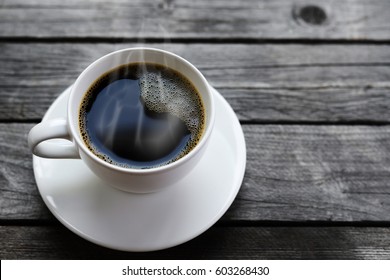 Cup of Coffee on wooden