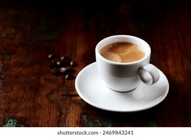 Cup of coffee on wooden background. Close up. - Powered by Shutterstock