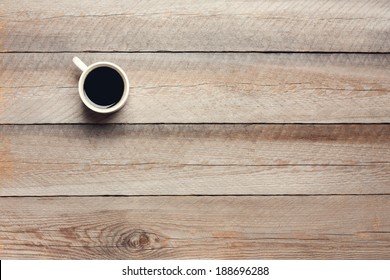 Cup of Coffee on Wooden Table, Top View