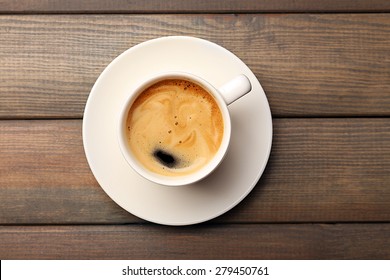 Cup Of Coffee On Wooden Table, Top View