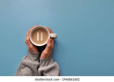 A cup of coffee and a pause icon. A break from work, a little rest
 - Shutterstock ID 1946861602