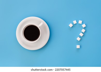 Cup Of Coffee And Question Mark Made Of Sugar, Flat Lay.