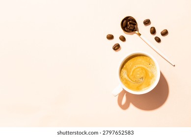 Cup of coffee, roasted coffee beans and filter holder at white background.