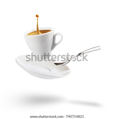 cup of coffee with saucer and spoon floating on white background with shadow