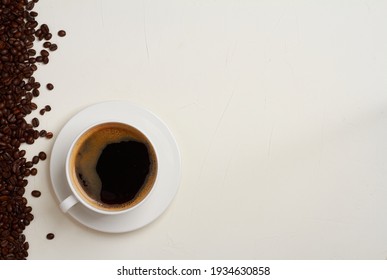 cup of coffee coffee seeds white background