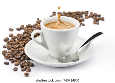 Cup Of Coffee With Splashing And Beans On White Background