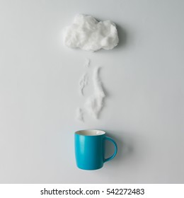 Cup Of Coffee With Steam And Cloud Made Of Cotton Wool . Flat Lay. Weather Concept