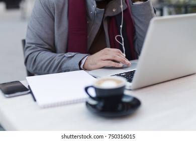 Cup of coffee at the table, close up