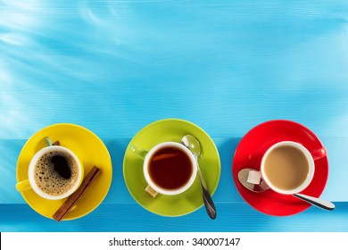 Cup Of Coffee And Tea On Wooden Background