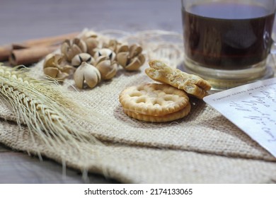 a cup of coffee and wheat cake filled with sweet cream - Shutterstock ID 2174133065