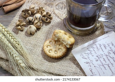a cup of coffee and wheat cake filled with sweet cream - Shutterstock ID 2174133067