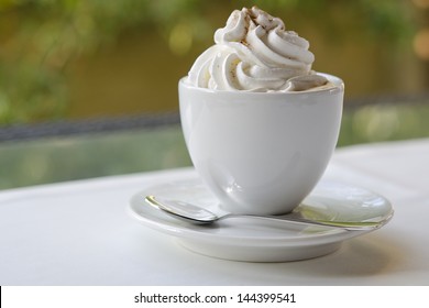 Cup Of Coffee With Whip Cream