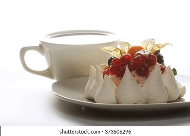 Cup Of Coffee And White Cake 