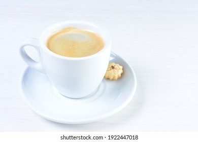 Cup Of Colombian Coffee, Decorated On White Wooden Background