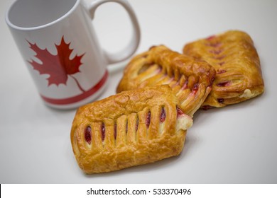 Cup With Cream Cheese Strawberry Butter Danish On White Background