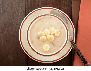 A Cup Of Cream Of Mushroom Soup Shot From Overhead