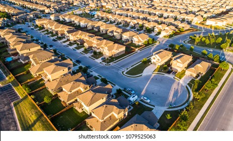 Cup De Sac At Sunset Suburb Housing Neighborhood Homes In Suburbia - Aerial Drone View - Above Austin , Texas , USA Perfect Cubed Square Houses Living Area In Real Estate Suburban Community At Sunset