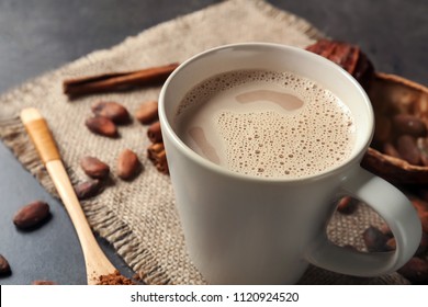 Cup Of Delicious Hot Cocoa On Grey Background, Closeup