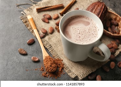 Cup Of Delicious Hot Cocoa On Grey Background