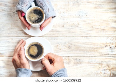 Cup drink for Breakfast in the hands of lovers. Selective focus. Food. - Powered by Shutterstock