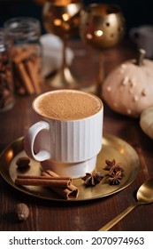 A cup of drink called Salep in a rustic wooden autumn atmospher