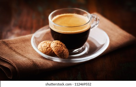 Cup of Espresso. Brown background.  - Powered by Shutterstock