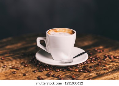 Cup Of Espresso Caffee Isolated On Wooden Table With Caffee Beans. Time For Caffee.