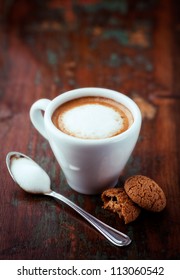 Cup Of Espresso Macchiato With Biscotti