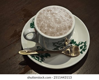 A cup of foamy pulled tea  - Powered by Shutterstock