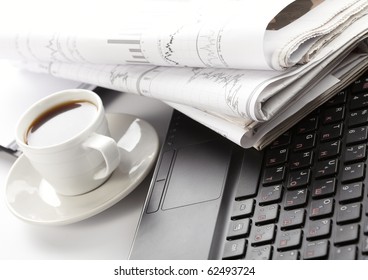 Cup Of Fragrant Coffee On A Morning Paper Business News