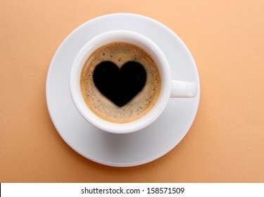 Cup Of Fresh Coffee With Heart Sign