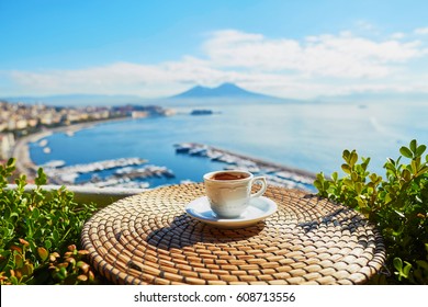 Cup Of Fresh Espresso Coffee In A Cafe With View On Vesuvius Mount In Naples, Campania, Southern Italy