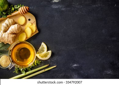 Cup Of Ginger Tea With Lemon And Honey On Slate Plate