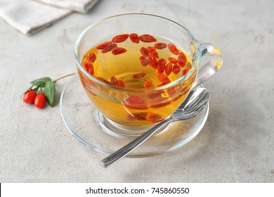 Cup With Goji Tea On Table