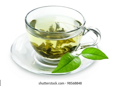 Cup with green tea and green leaves.