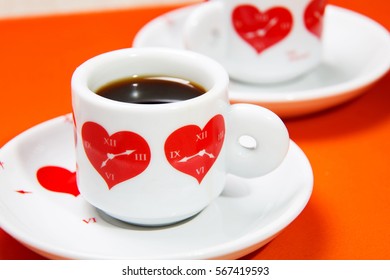 Cup with hearts.