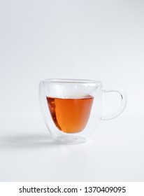 Cup Hot black tea, front view isolated on white background. - Shutterstock ID 1370409095