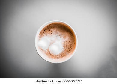 Cup of hot chocolate from the top in a rainy day  - Powered by Shutterstock