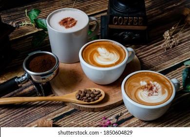 A cup of hot cocoa and coffee with biscuits in a leisurely afternoon tea - Powered by Shutterstock