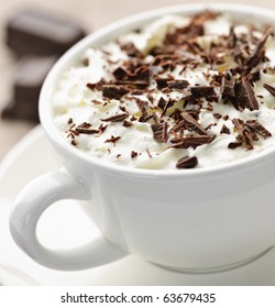 Cup Of Hot Cocoa With Shaved Chocolate And Whipped Cream