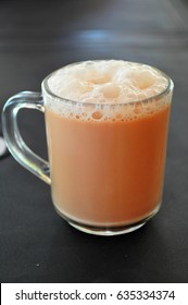 A Cup Of Hot Milk Tea With Full Of Bubble On Black Table, Popular Drink In Malaysia Called 