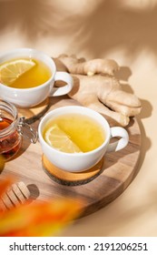  Cup Of Hot Tea With Ginger, Honey And Lemon On The Beige Background Vertical Photo