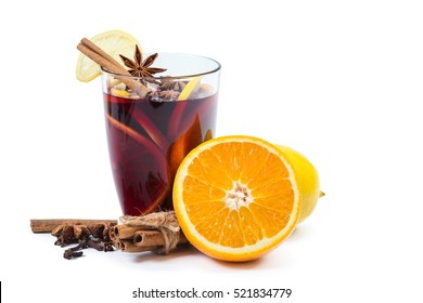 Cup Of Hot Wine With Spices On White Background