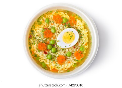 Cup Of Instant Noodles With Vegetables. Top View. Isolated On White.