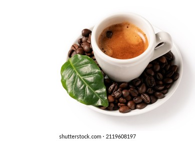 Cup of italian espresso with coffee beans and leaf, isolated on white background 