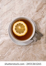  A cup of lemon tea... with a slice of lemon.